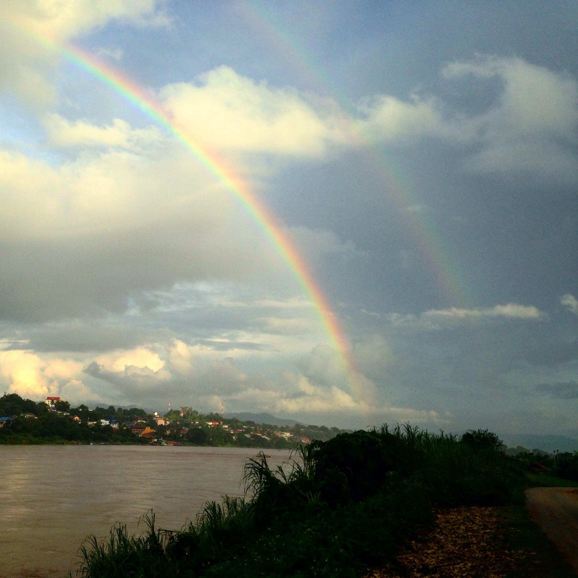 A double rainbow over the Mekong River, with one end in Thailand and the other in Laos. A double rainbow over the Mekong River, with one end in Thailand and the other in Laos.