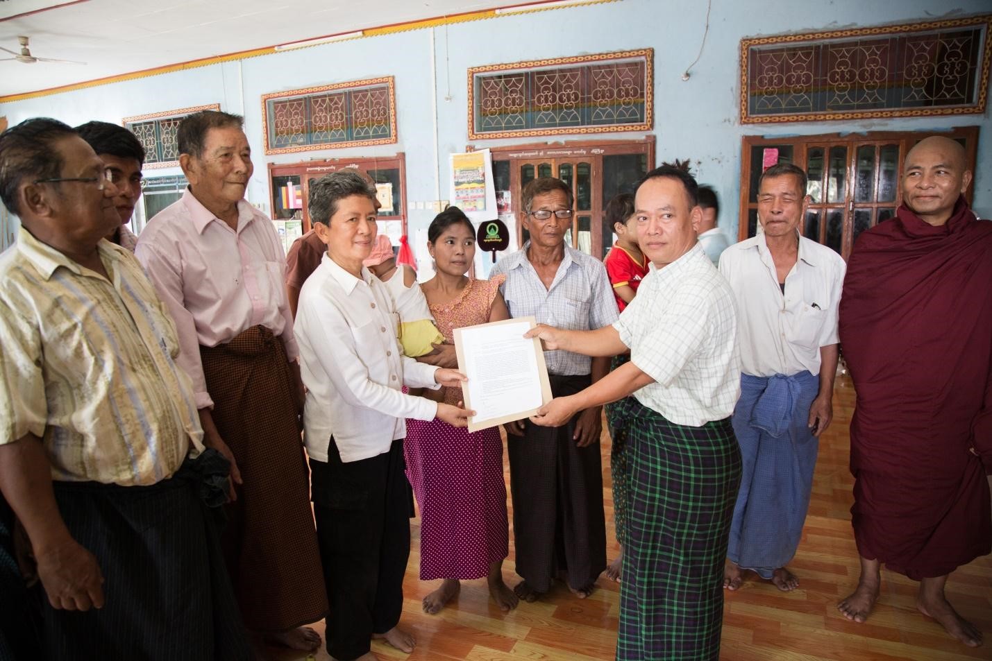 A representative of CSO groups and villagers submitted a petition to Ms. Tuenjai Deetes (middle), Commissioner of the National Human Rights Commission of Thailand on 25 February 2017 at Maying Gyi village