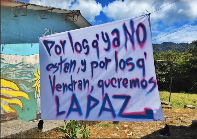 A sign in the U’wa village: “For those who are no longer here, for those who will come, we want peace”